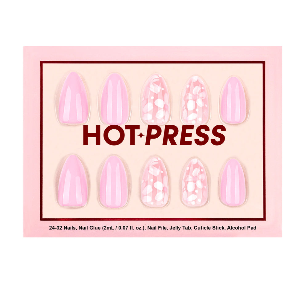 Hot Press Do-It-Yourself Nail kit with pink base and flower accent nails.