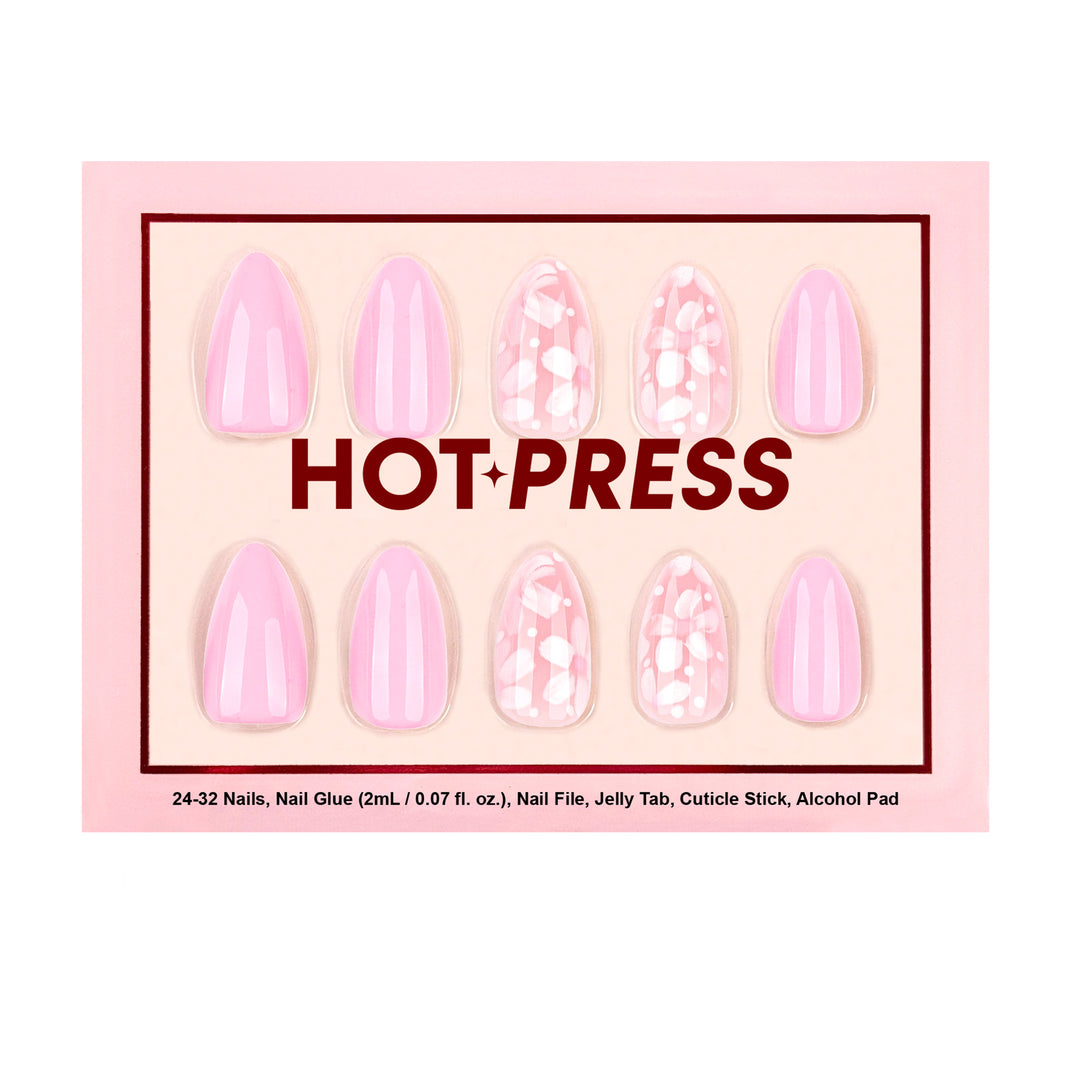 Hot Press Do-It-Yourself Nail kit with pink base and flower accent nails.