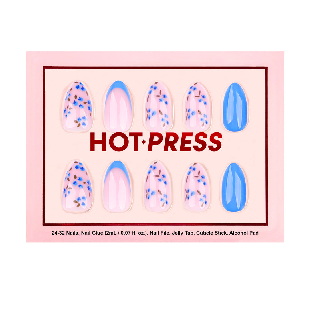 Medium almond press-on nails with a sheer base, featuring bright blue French tips, solid blue accent nails, and detailed blueberry cluster illustrations.