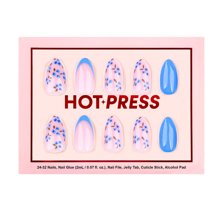 Medium almond press-on nails with a sheer base, featuring bright blue French tips, solid blue accent nails, and detailed blueberry cluster illustrations.