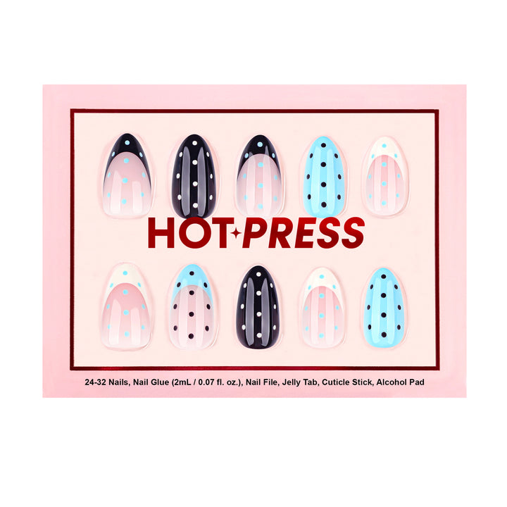 Oval press-on nails in a mix of light blue, black, and white with French tips and contrasting polka dots.