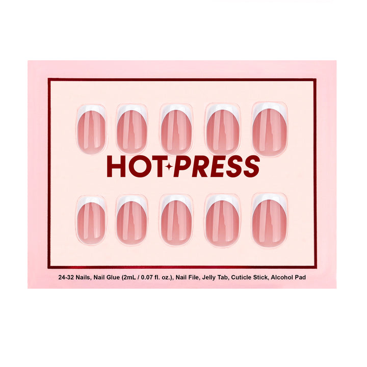 Bonjour French short oval press-on nails featuring a high-gloss blush pink base with white French tips and detailed red cherry accent art.
