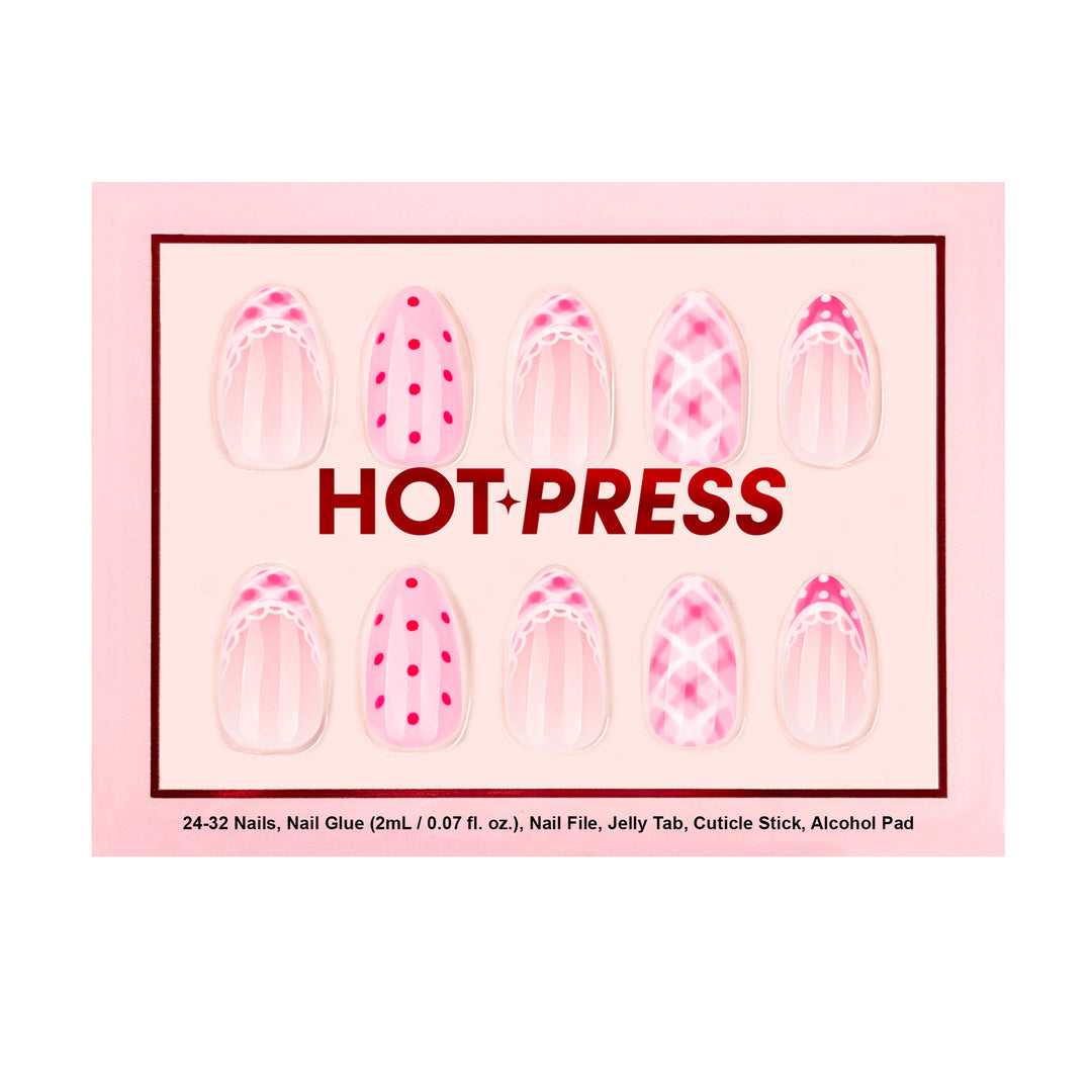 Almond-shaped press-on nails featuring a mix-and-match pink design with hot pink polka dots, sheer vertical stripes, plaid patterns, and white lace trim accents.