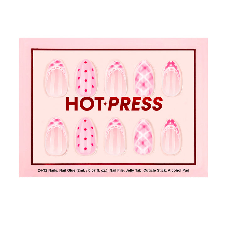 Almond-shaped press-on nails featuring a mix-and-match pink design with hot pink polka dots, sheer vertical stripes, plaid patterns, and white lace trim accents.