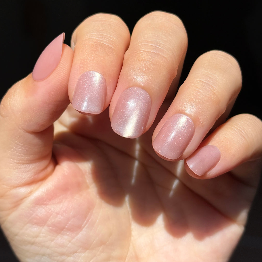 Coconut Velvet short square press-on nails featuring a clean light natural pink nude base topped with a blinding multi-dimensional silver velvet cat-eye magnetic reflection.