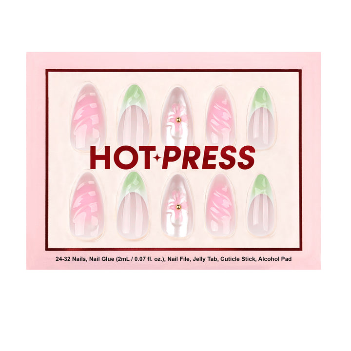 Medium almond press-on nails with a soft pink aura gradient base, featuring sage green French tips and hand-designed 3D pink flowers with gold bead centers.
