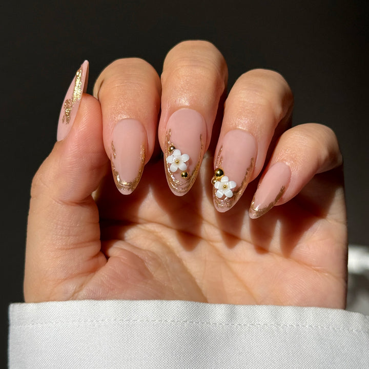 Pure Intentions short oval press-on nails featuring a sheer pink base, micro white French tips, and precise clear 3D raised heart accents.