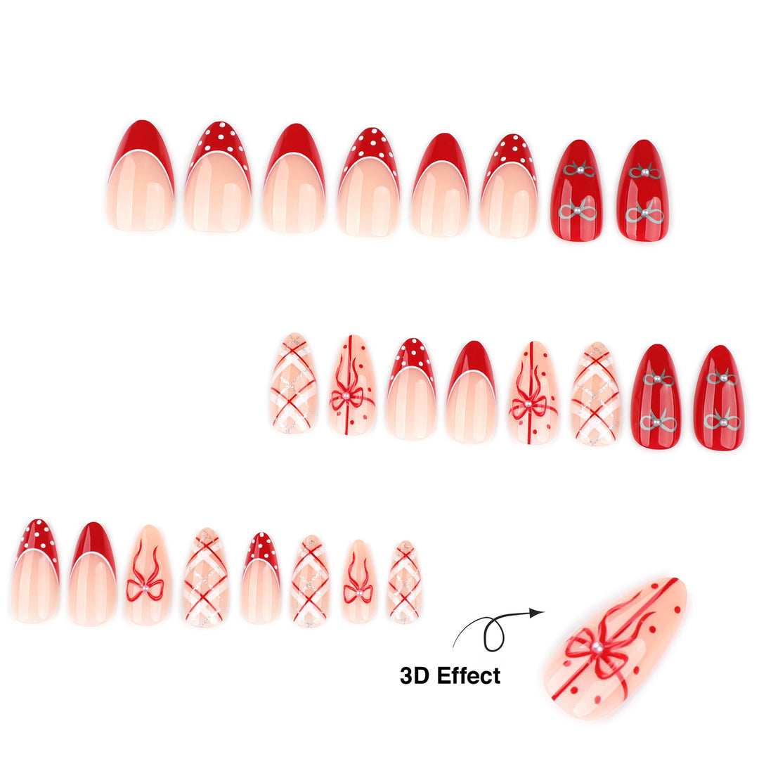 Tapered almond press-on nails featuring a red and white holiday theme. Designs include red French tips with white polka dots, solid red nails with silver bows, silver glitter plaid patterns, and nude nails with a large red 3D-style bow and pearl center.
