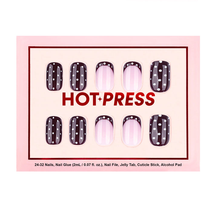 Square press-on nails with a mix of solid black nails with white dots and maroon French tips with white dots.