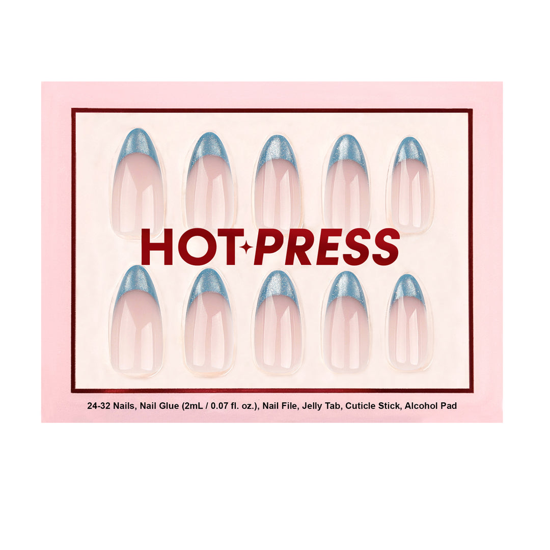 Velvet Nebula short almond press-on nails featuring a shifting blue cat-eye magnetic French tip design.