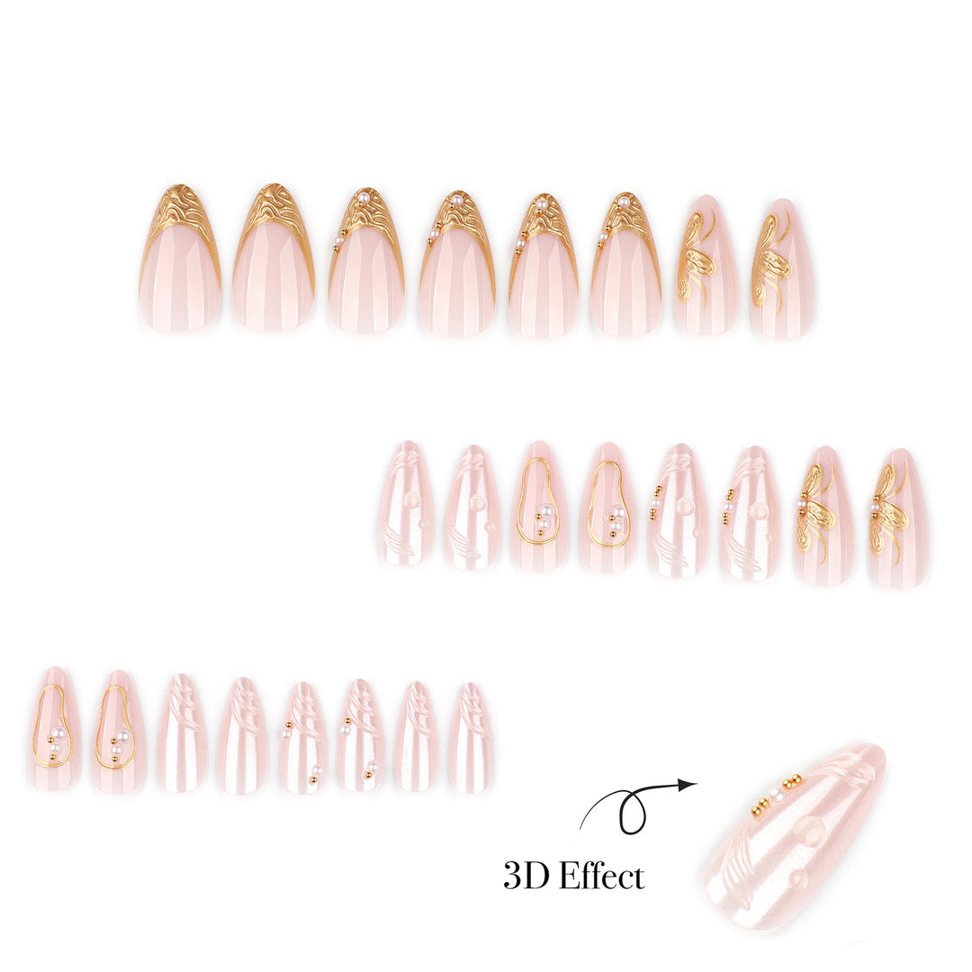 Enchanted Whisper medium almond press-on nails with a glazed white pearl finish, clear 3D raised textures, and gold tip accents.