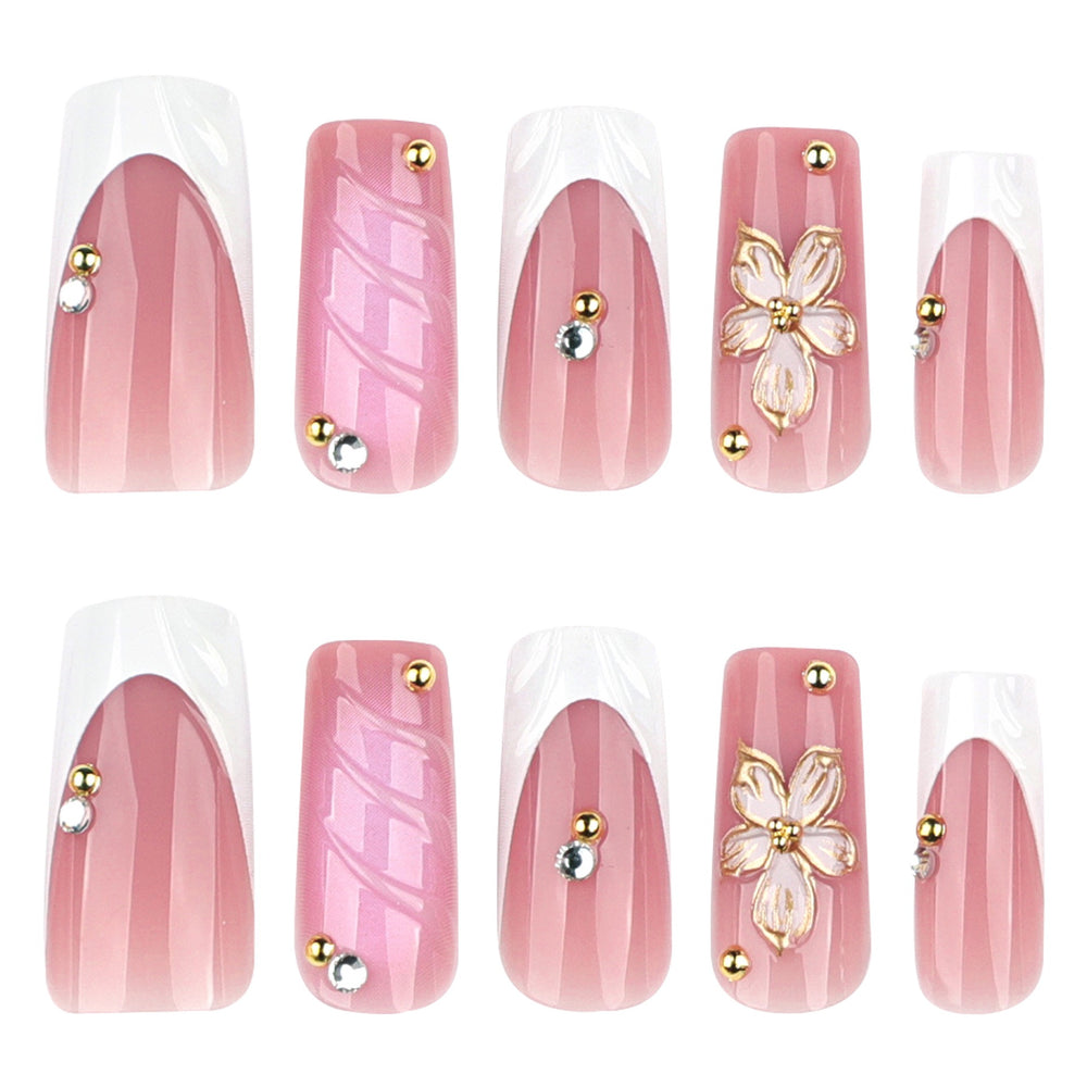 nchanted Elegance medium almond bridal press-on nails featuring white French tips decorated with 3D white bows, pearls, and crystal rhinestones.