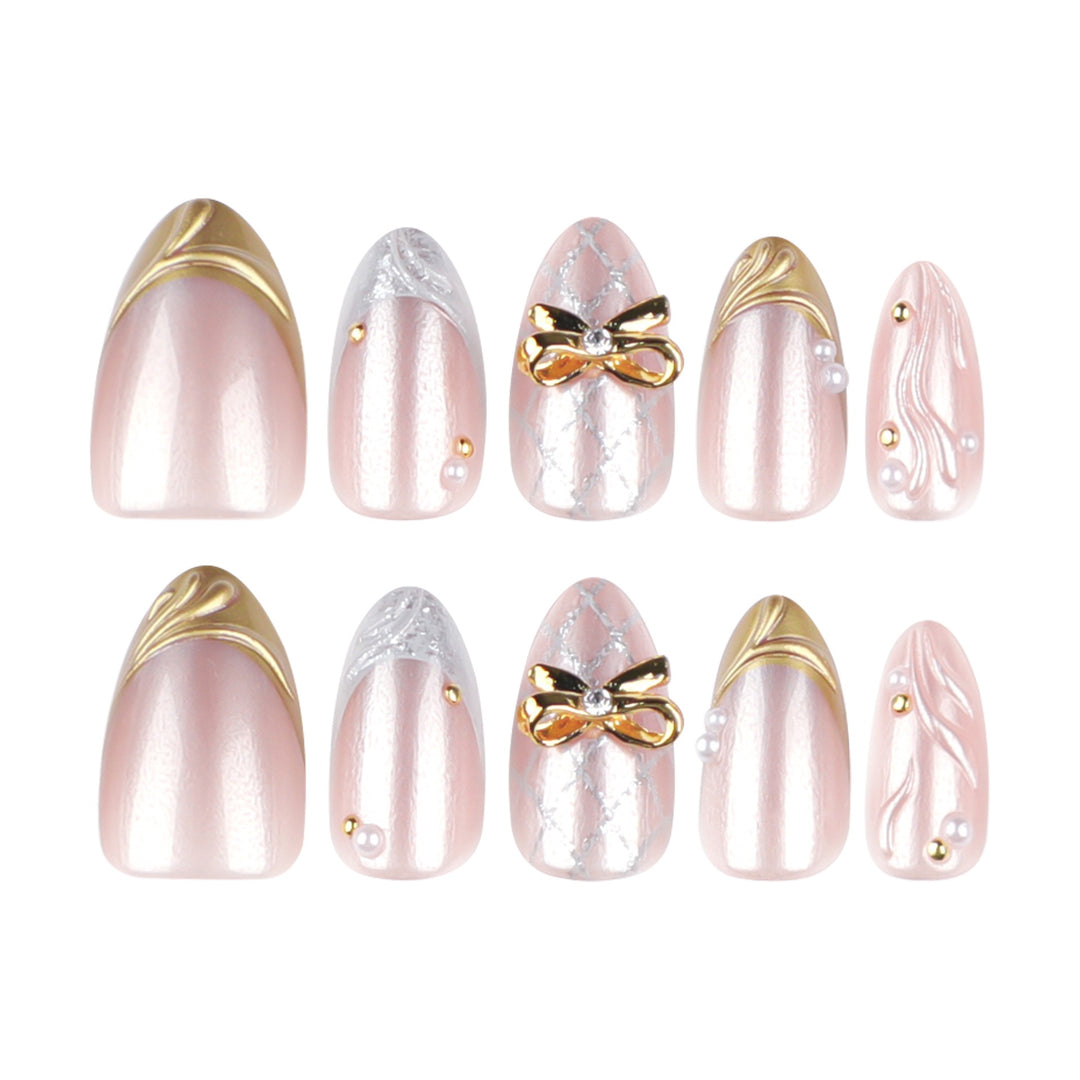 Everlasting Bloom medium almond bridal press-on nails featuring a milky white base decorated with textured 3D white flower petals and delicate pearl clusters
