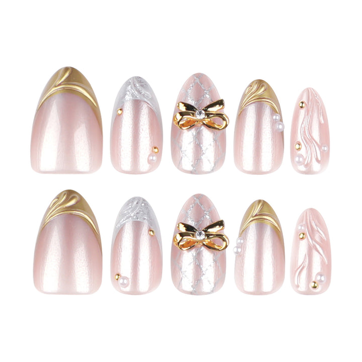 Everlasting Bloom medium almond bridal press-on nails featuring a milky white base decorated with textured 3D white flower petals and delicate pearl clusters