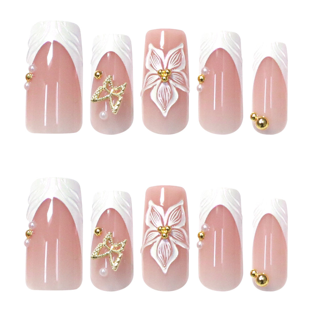 Petal Pathway medium almond bridal press-on nails featuring a translucent milky white base detailed with abstract white swirl line art and wavy squiggles.