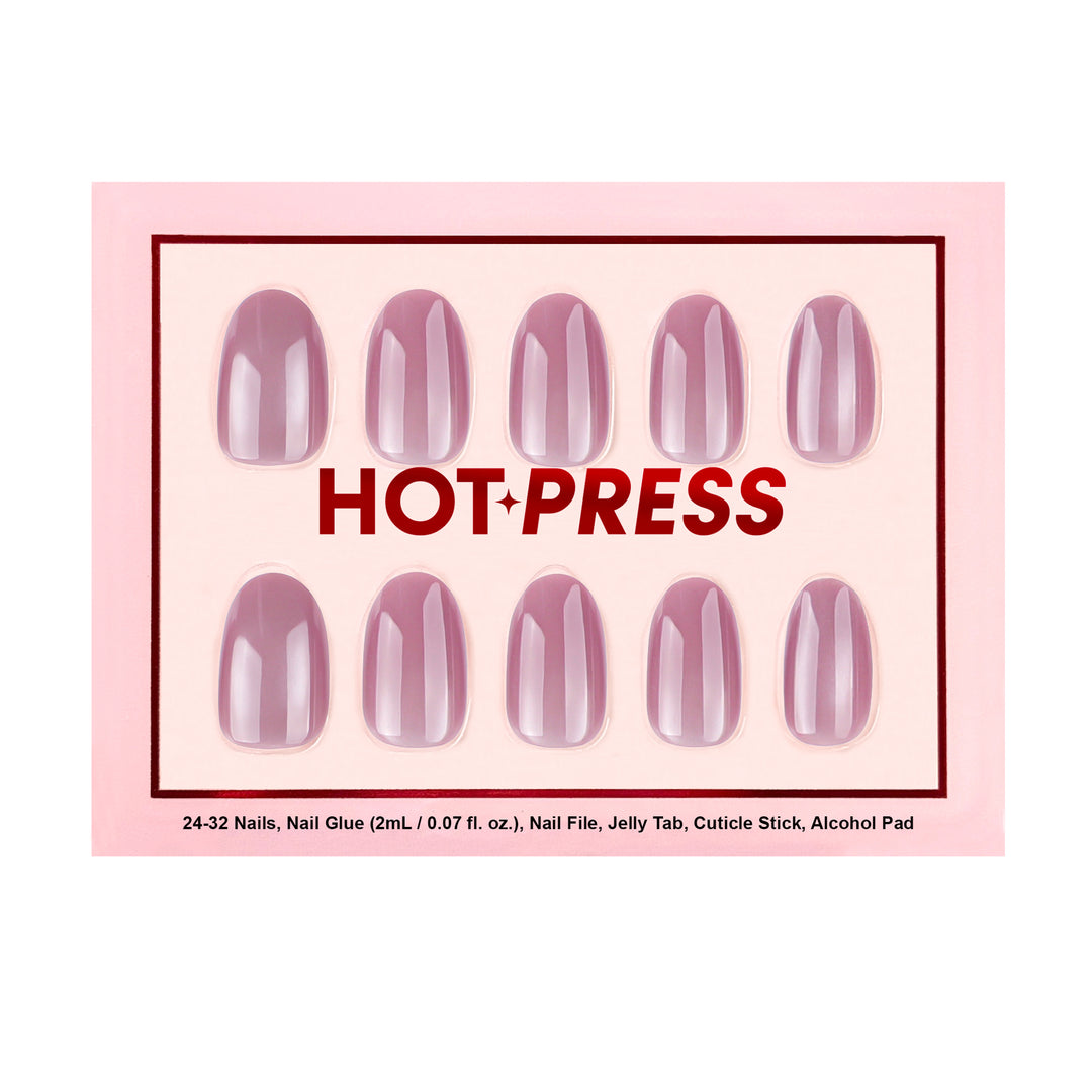 Sweet Plum medium almond press-on nails featuring a solid, ultra-polished muted dusty plum purple base coat.