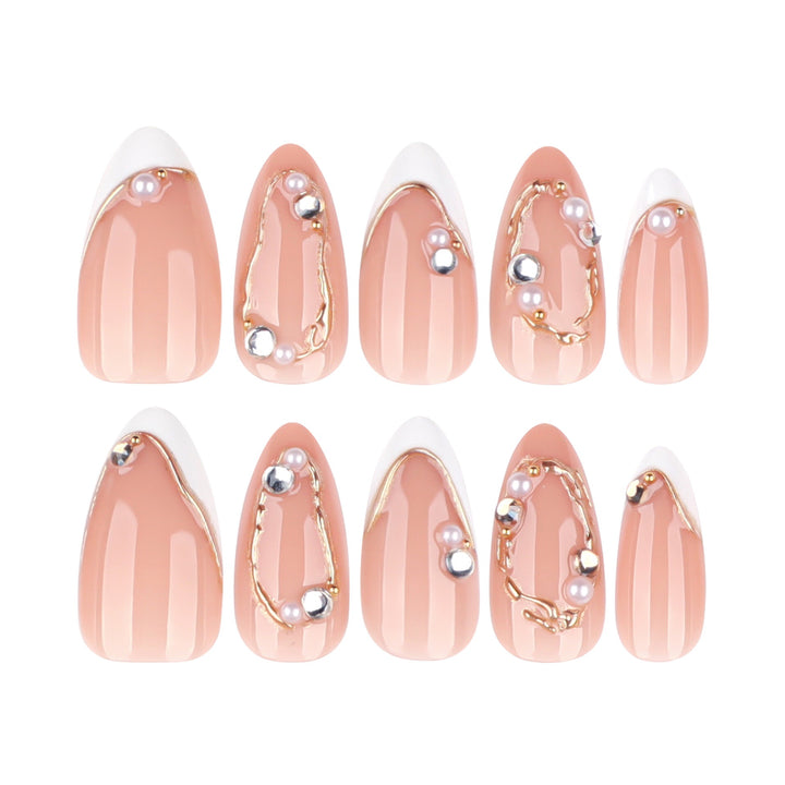 Toast to Us medium coffin press-on nails featuring a milky white base, clear 3D raised bows, architectural ribbed texture, and silver rhinestone cuticle details.